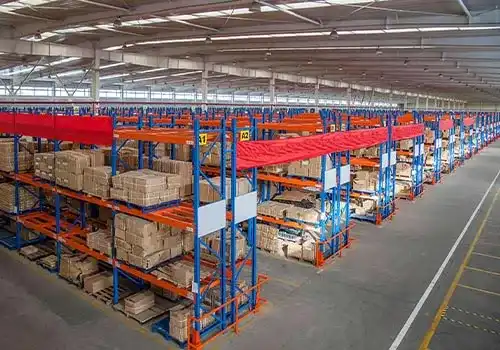 Selective pallet racking with orange beams and blue upright frames