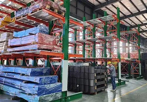 Cantilever racking system storing long steel pipes and lumber